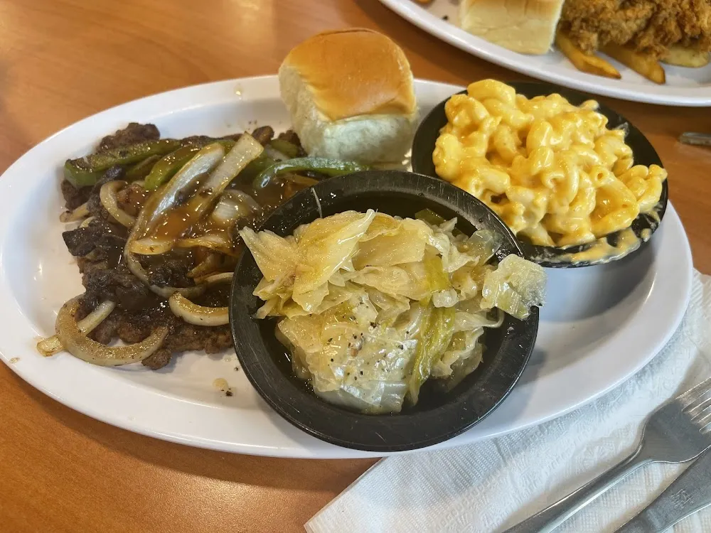 Hamburger Steak with Gravy Cabbage Macaroni and Cheese with a Roll